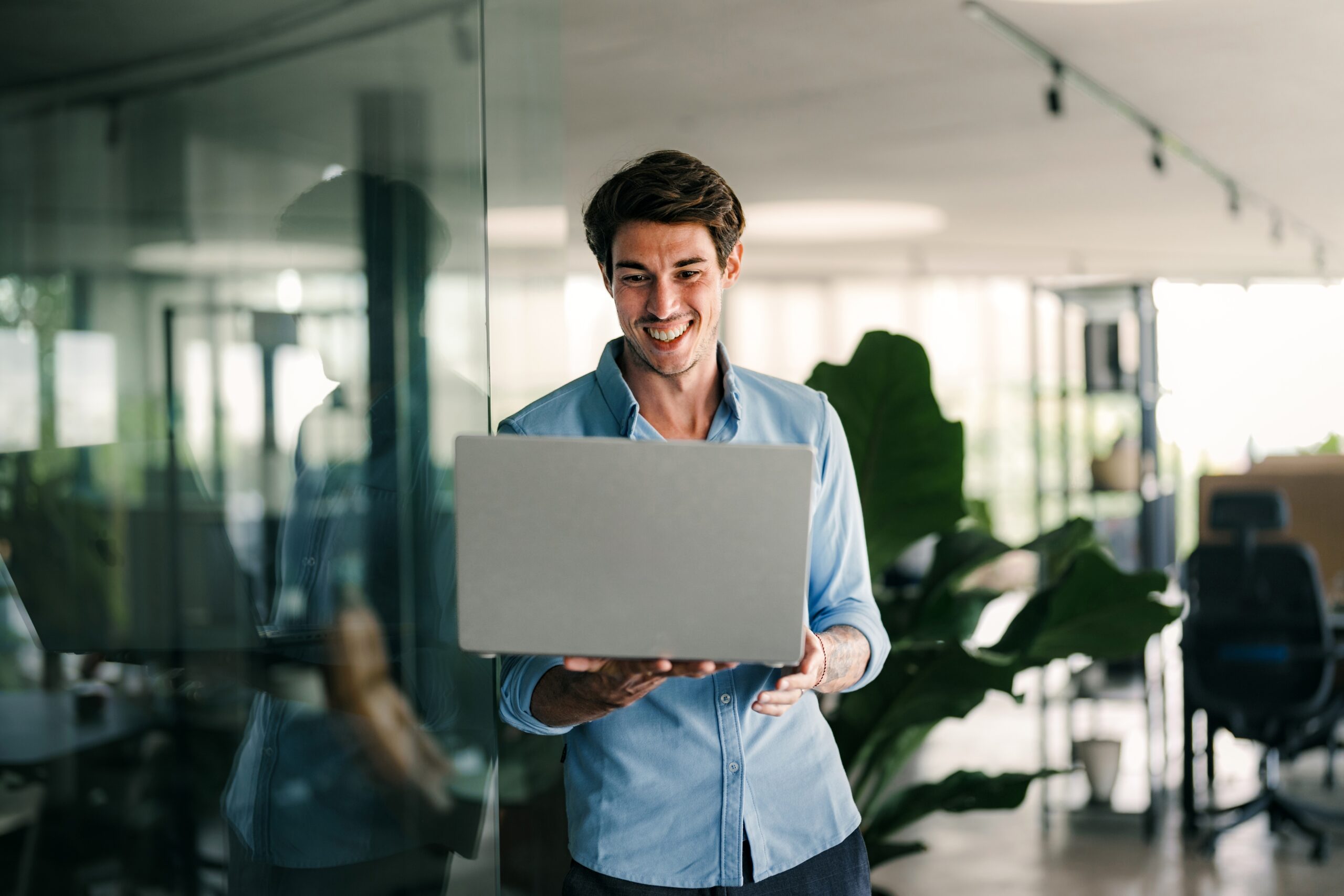 A business development professional on his laptop